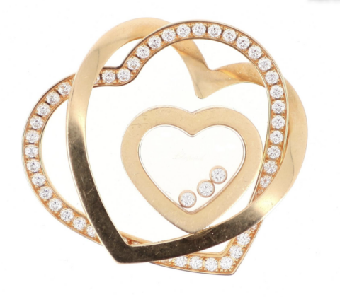 CHOPARD Pendentif "Happy Diamond" en or rose Adjugé 1 500 euros Millon
