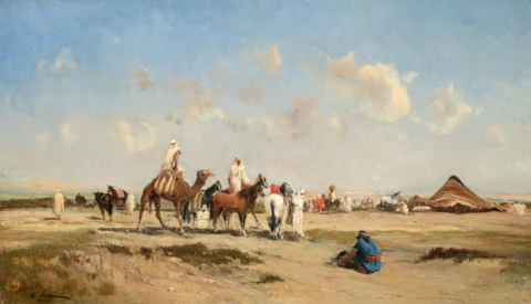 VICTOR HUGUET (1835-1902) Halte des chameliers et cavaliers en Afrique du Nord Huile sur toile Adjugé à 4 000 €