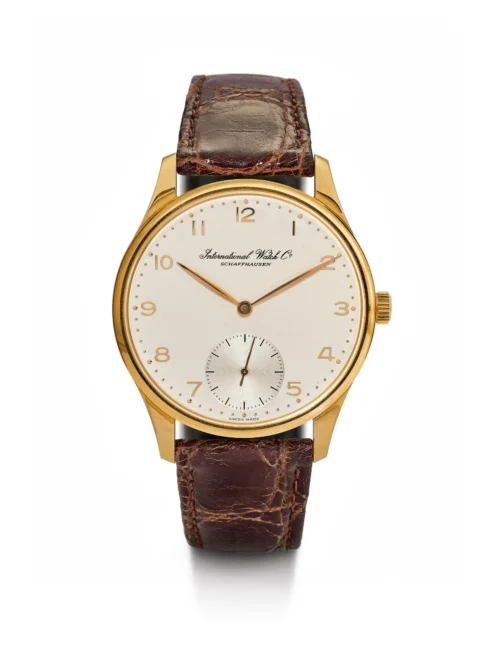 IWC, édition limitée portugaise, 1999 Or rose 750. D 42 mm. Numéro de référence : 5441 Boîtier No. : 2572642, édition limitée No. 488 / 500, fond avec verre saphir Cadran : Cadran argenté avec petite seconde à 6 heures Mouvement : Mouvement à remontage manuel très raffiné No. 2500491, avec balancier à vis, spiral Breguet et régulateur à col de cygne, Cal. 9828 avec 19 rubis Bracelet : Bracelet en cuir de crocodile avec boucle ardillon en or rose IWC