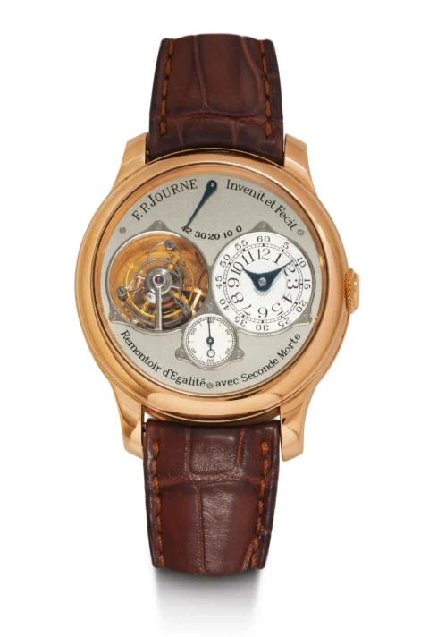 F.P. Journe, rare et exceptionnellement bien conservé Tourbillon Souverain, 2006. Or rose 750. D 40 mm. Numéro de référence : TN Classique Boîtier : 244, boîtier massif avec fond d'exposition en verre saphir. Cadran : Cadran gris, avec cadrans auxiliaires argentés guillochés, réserve de marche à 12h Mouvement : Très beau mouvement à remontage manuel en or rose 18 ct, cal. 1403 avec 26 rubis. Tourbillon à transmission de force constante - remontoir 1 seconde, seconde sautante Bracelet : Bracelet en crocodile F.P. Journe
